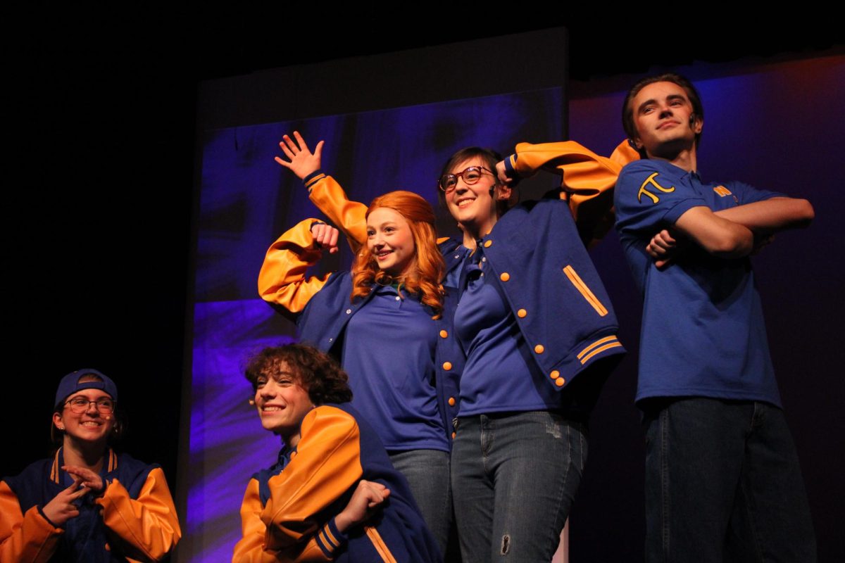 Orion Wright, Nathan Bone, Presley Zarfas, Elise Ascura, and Ahren Peterson pose as “The Mathletes” at the end of the song “Do Your Thing” during the opening night of Mean Girls, Nov. 16, 2023. “Do Your Thing” is an upbeat victory song that takes place after the Mathletes win a math competition near the end of the musical.
