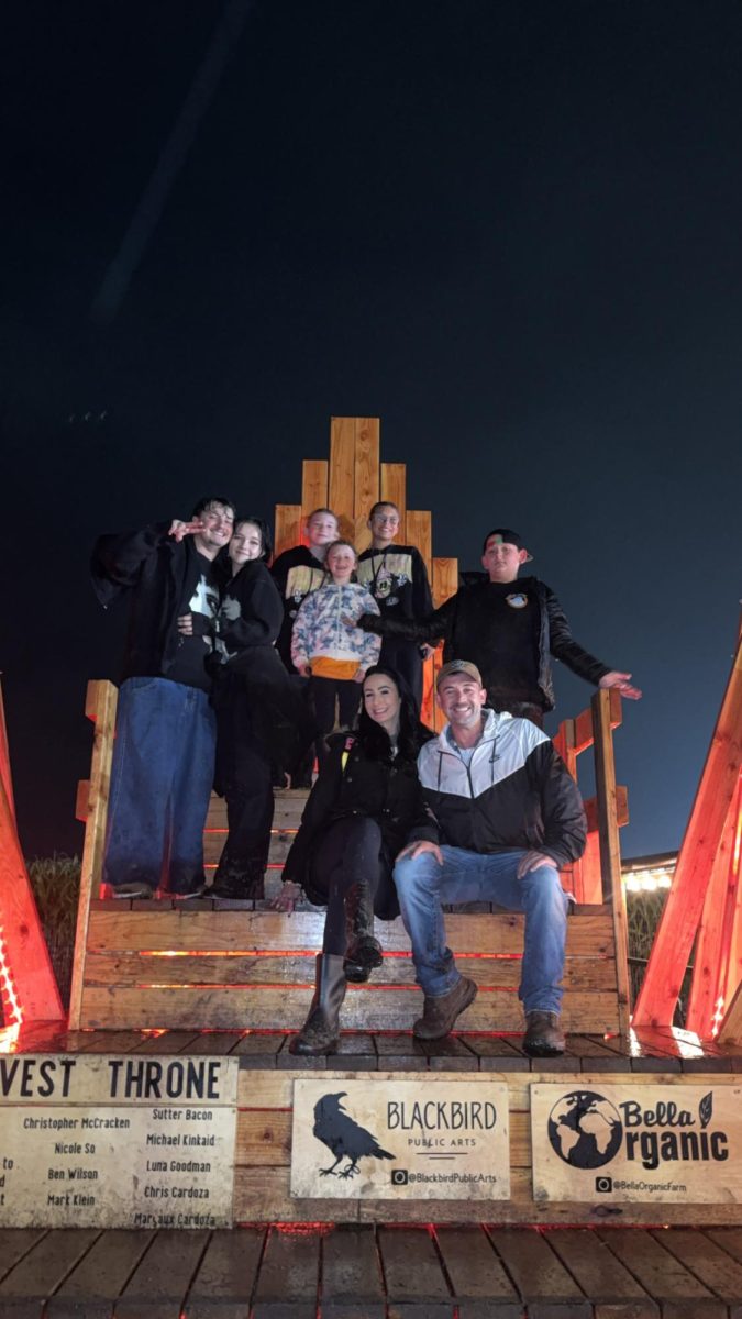 Photo of Jacob Cook and his group after they went through the Haunted Corn Maze at Bella Organic Farms. 