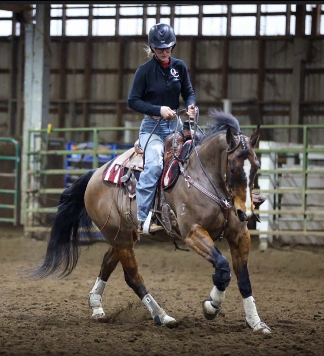 Senior Callie Arnold is riding her horse, Annabell, during the second meeting in their reining class. They were competing in McMinnville, Oregon, in March, where over 100 athletes were competing with their horses over a time span of 4 days.